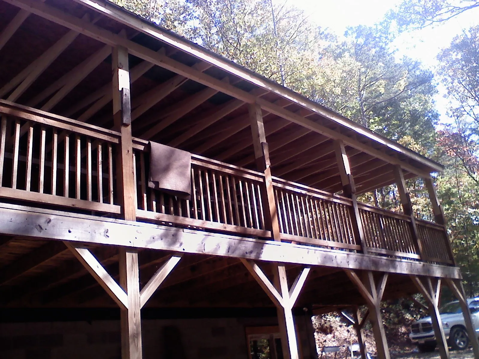 Timber framing under a new elevated porch and deck — Roof Leak Repair in Crestview by Roofing Brothers